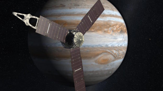 La sonda spaziale Juno in una ricostruzione grafica davanti a Giove